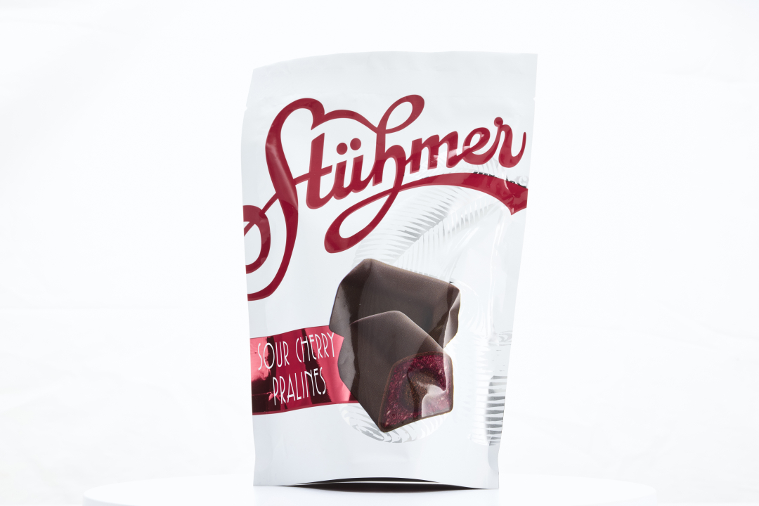 FRUIT DESSERT  Almond marzipan with sour cherry and chocolate cream, covered with dark chocolate